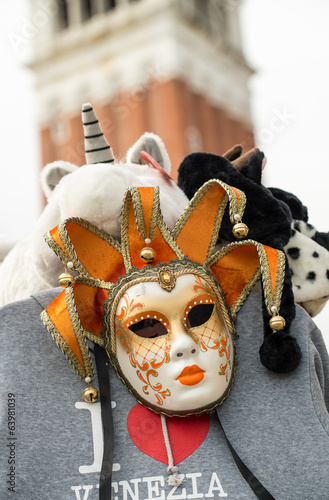 Fototapeta Naklejka Na Ścianę i Meble -  Venice mask under St Mark Campanile
