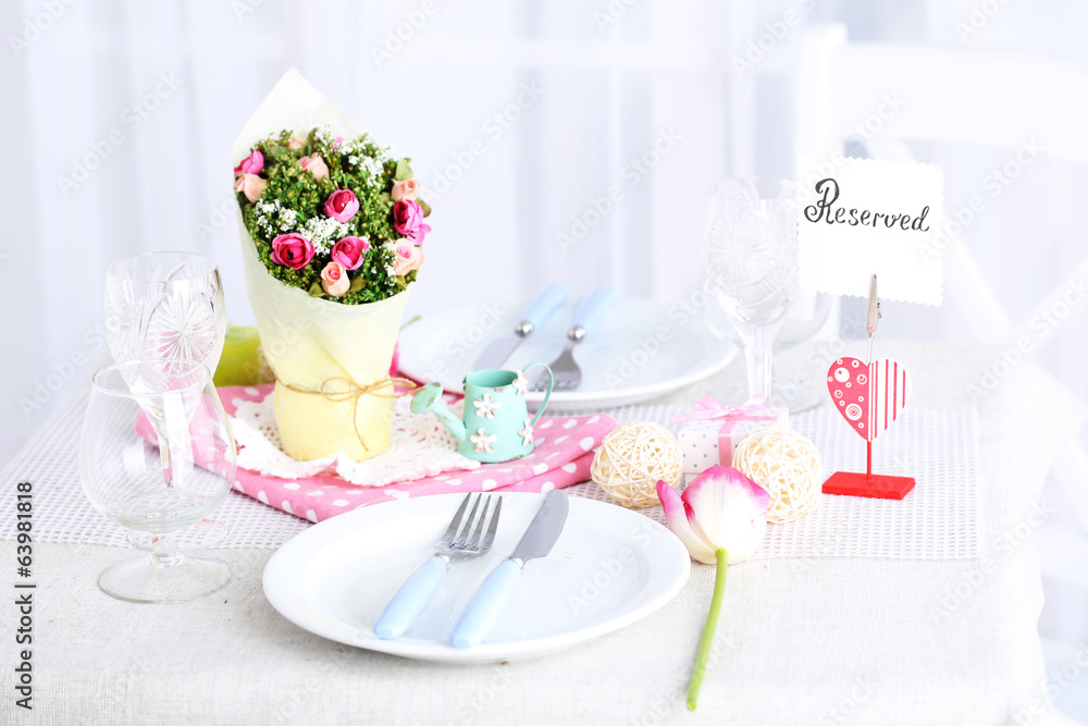 Beautiful spring table setting on light background Beautiful spring table setting on light background