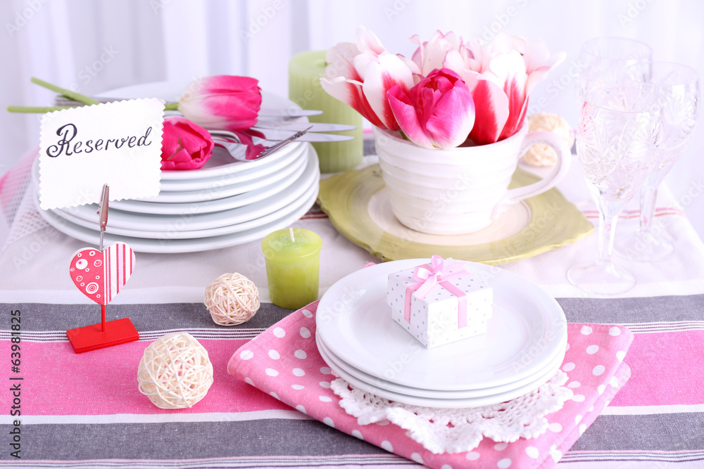 Beautiful spring table setting on light background