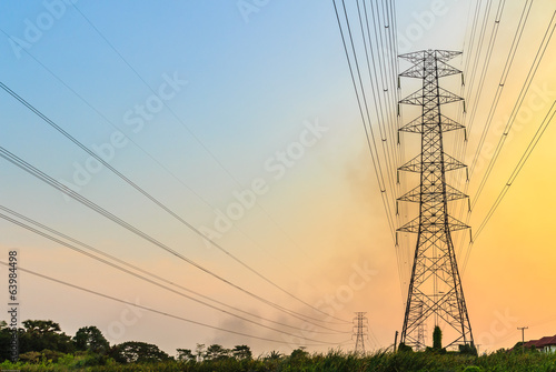 High voltage power lines at sunset.