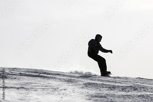 Silhouette of a skier on the hill. Sport and active life