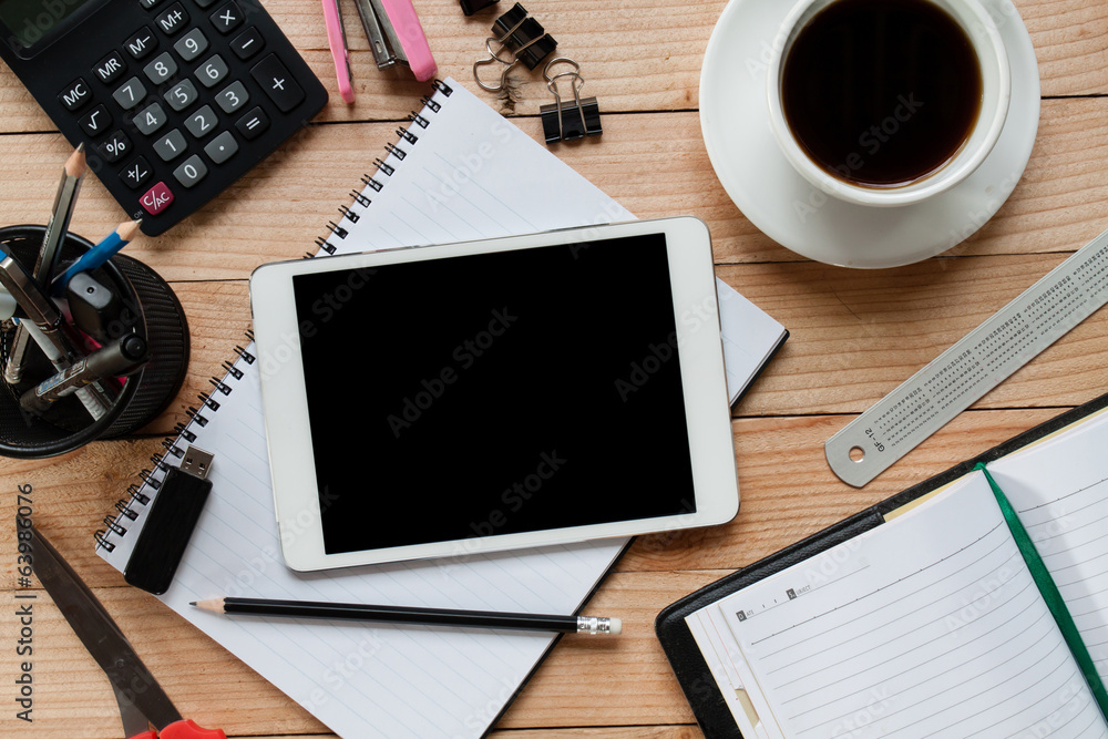 worktable covered with documents. Above view shot. worktable covered with documents. Above view shot.