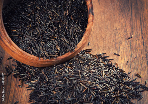 wild rice in a wooden bowl photo