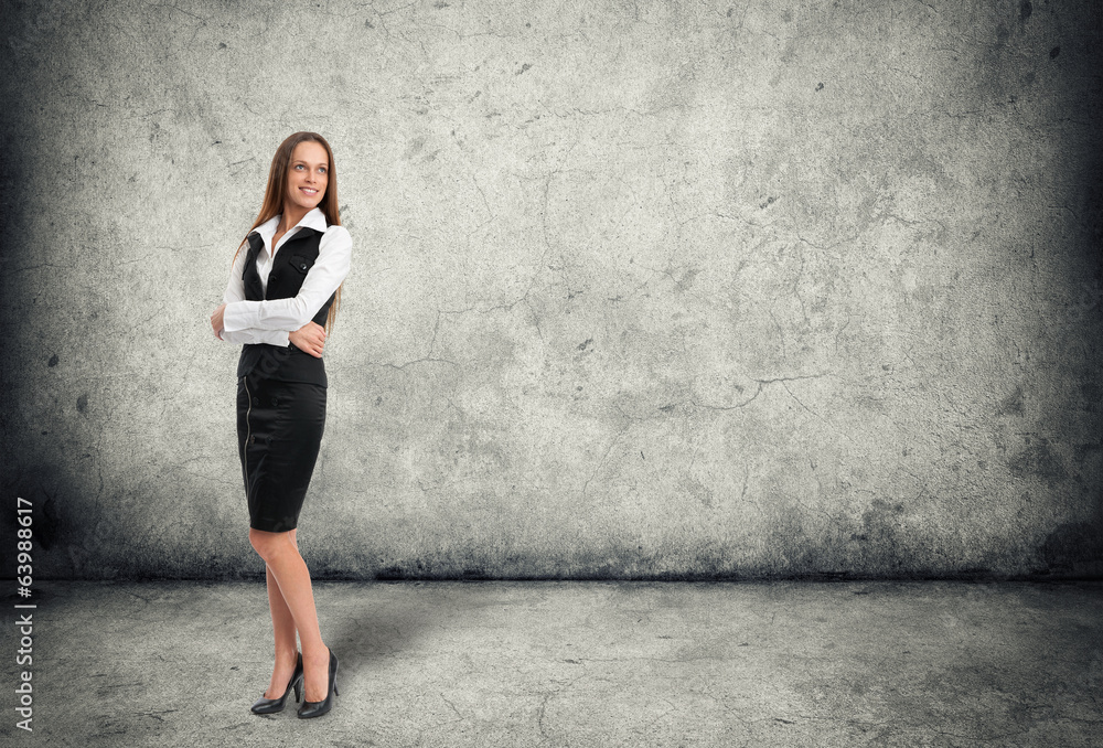 Fototapeta premium Full length portrait of a happy business woman