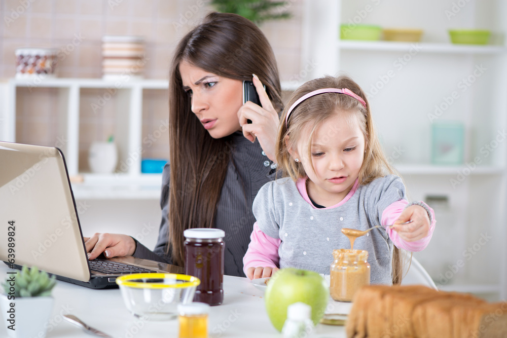 Overworked Businesswoman and her daughter in the morning. Overworked Businesswoman and her daughter in the morning.