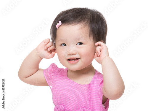 Asian baby girl two hands touch her ear