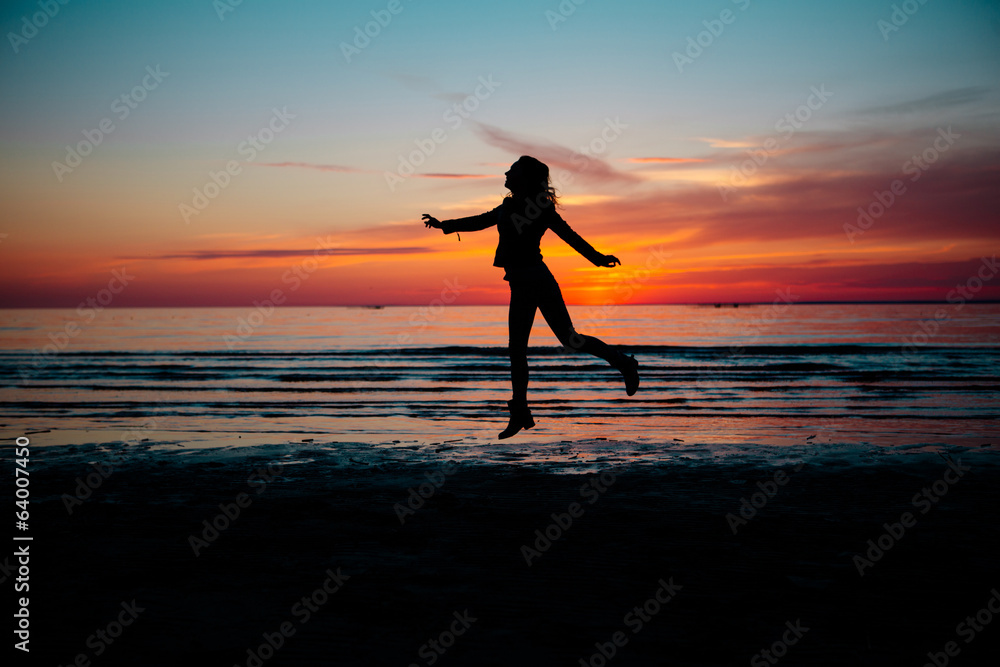 Silhouette of Woman on the Sunset