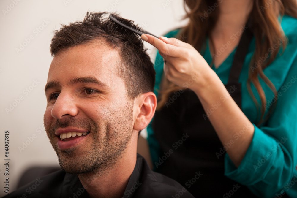 Obraz premium Happy customer in a hair salon