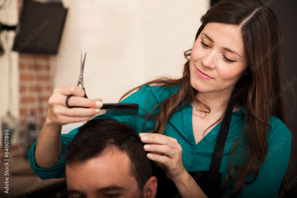 Fototapeta premium Happy hairstylist at work