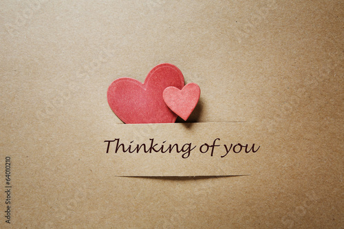Thinking of you message with red paper hearts