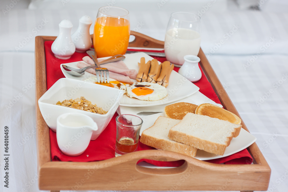Breakfast on tray in bed