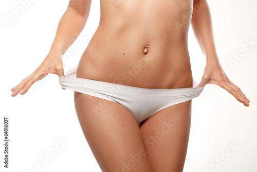 Beautiful female body isolated over white background.