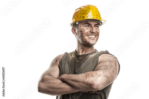 Fotografia portrait of dirty worker with helmet crossed arms