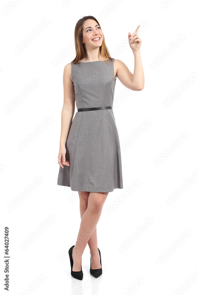 Full body of a standing woman pointing at side Full body of a standing woman pointing at side