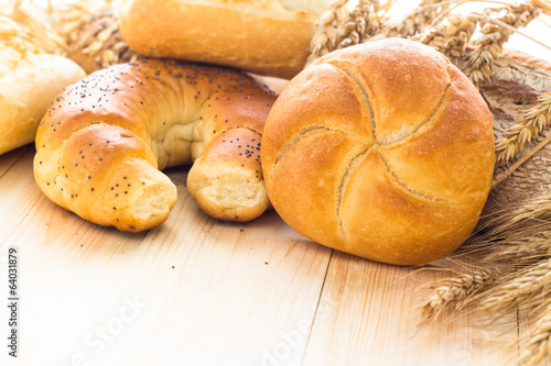 Various bakery products wooden background