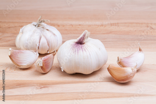 garlic on wooden cutter board