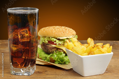 fast food with hamburger, french fries and glass of cola