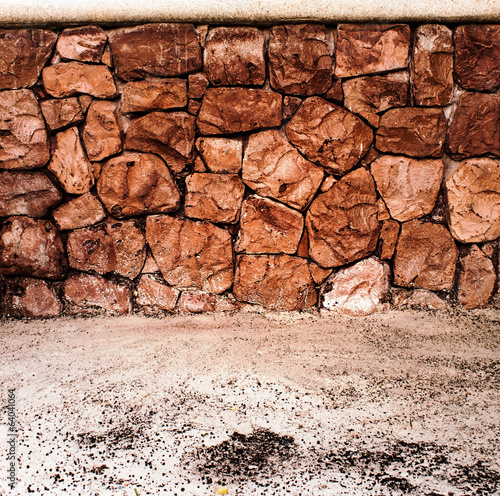 stone wall and sand