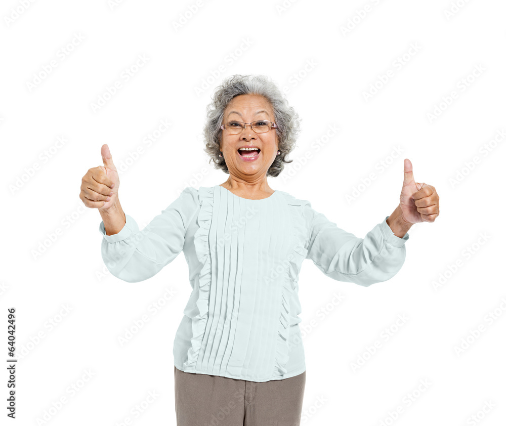 A Cheerful Old Casual Woman Giving a Thumbs Up A Cheerful Old Casual Woman Giving a Thumbs Up