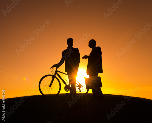 Businessmen on the Way During Sunset