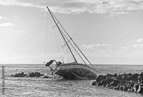 Boat on the Rocks on Easter Island Pacific Ocean	 photo