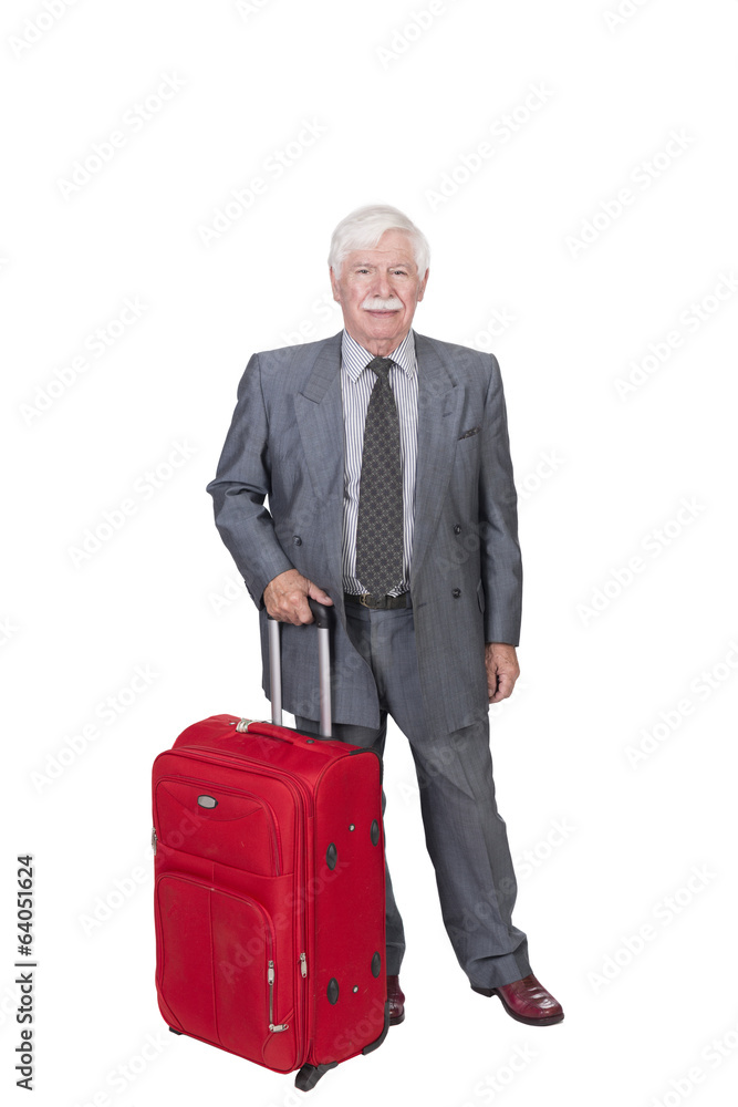senior citizen with red suitcase standing on a white background senior citizen with red suitcase standing on a white background