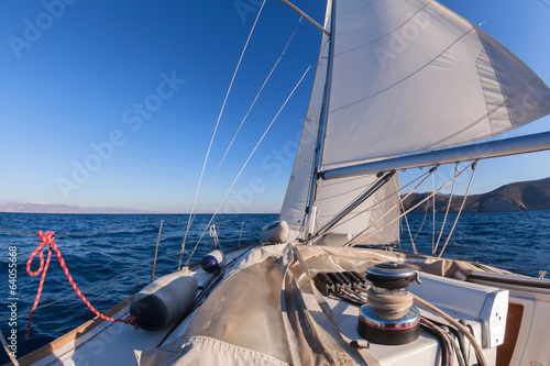 Winch with rope on sailing boat