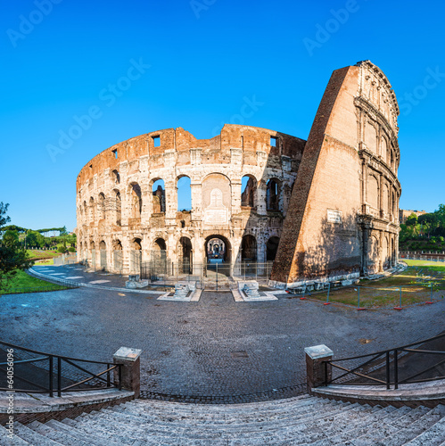 Flavian colosseum amphitheater in Rome at sunset photo