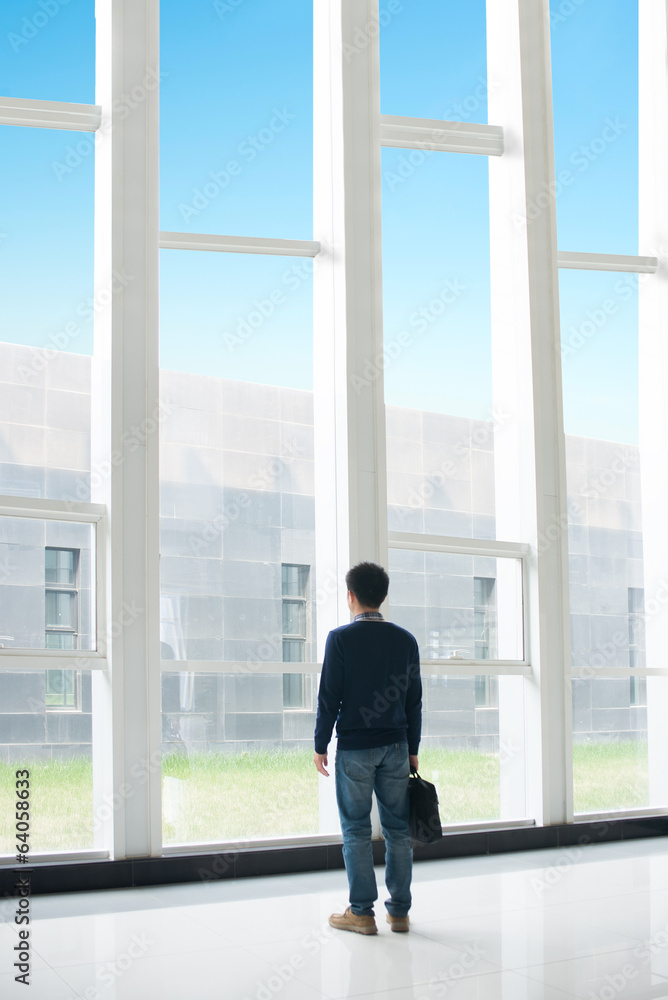 Man standing in the hall Man standing in the hall
