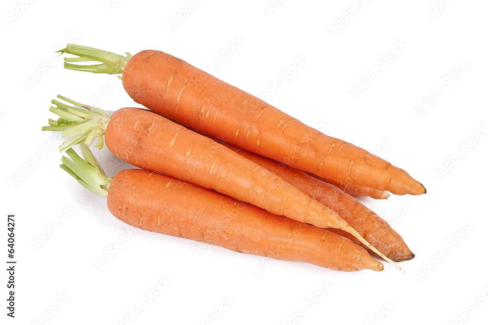raw and fresh carrots in closeup over white raw and fresh carrots in closeup over white