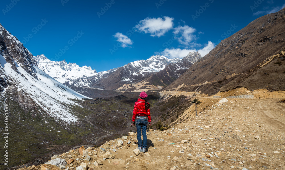 woman stands near Chopta Valley ,Sikkim,India
