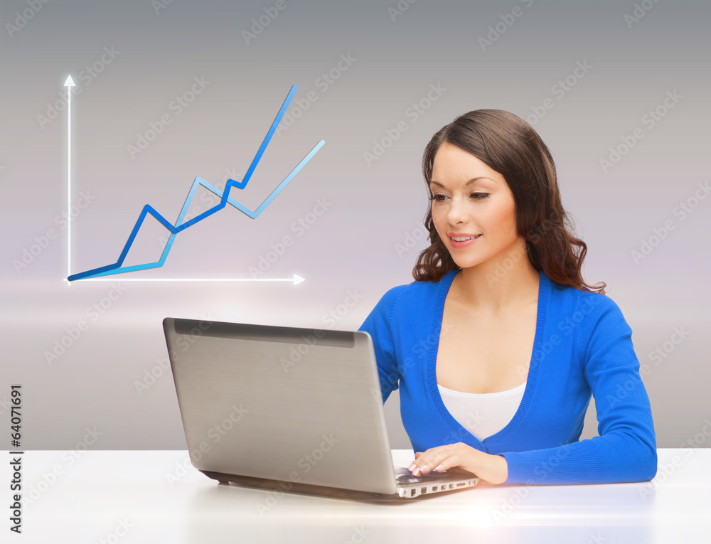 smiling woman in blue clothes with laptop computer smiling woman in blue clothes with laptop computer