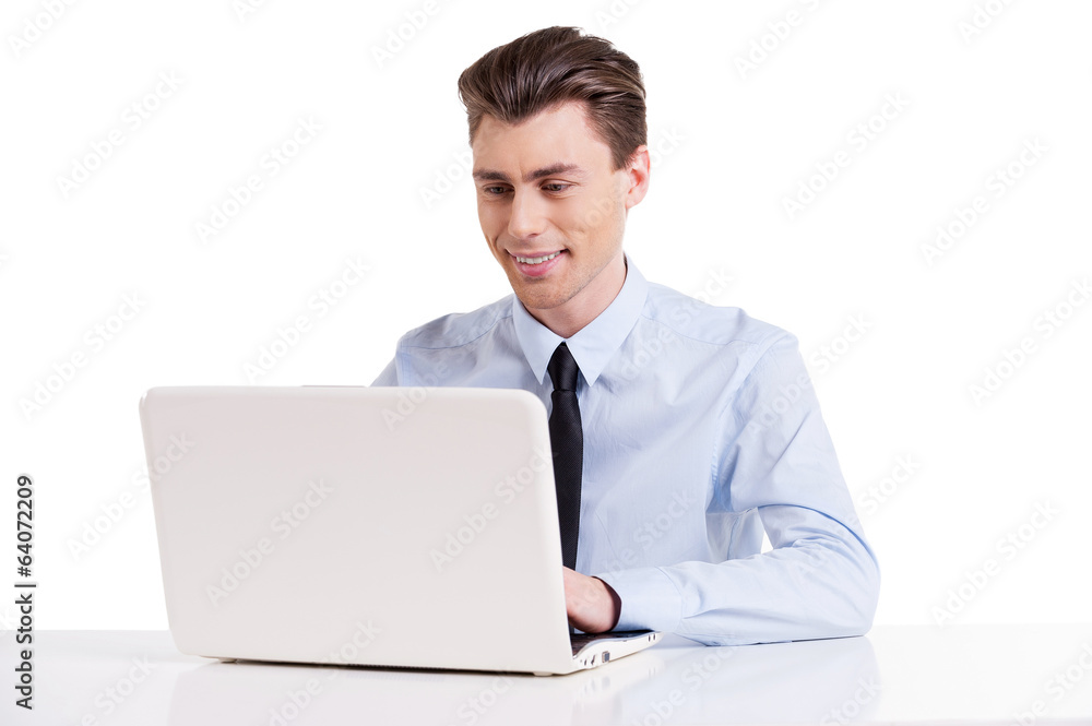 Businessman working on laptop. Businessman working on laptop.