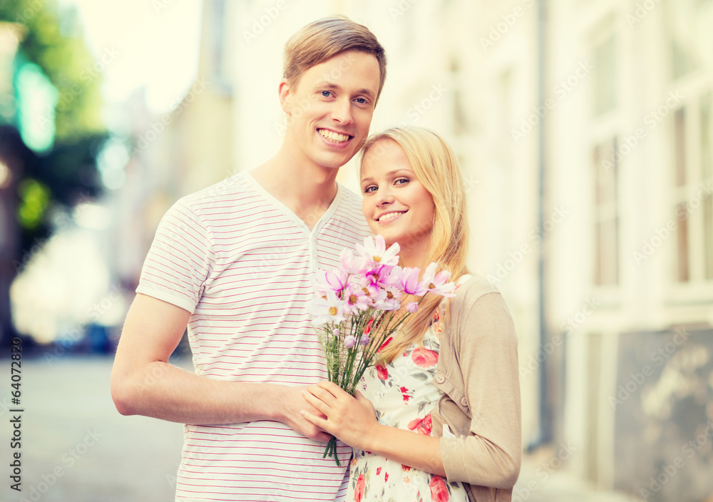 couple with flowers in the city couple with flowers in the city