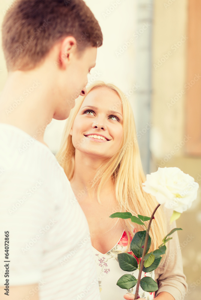 couple with flowers in the city couple with flowers in the city