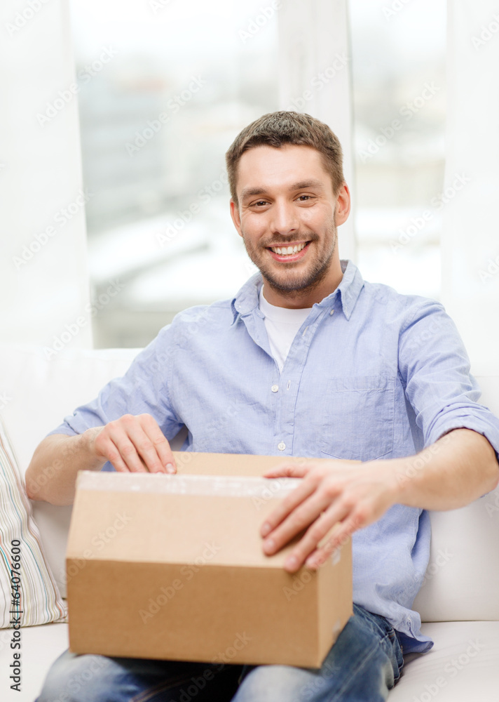 man with cardboard boxes at home man with cardboard boxes at home