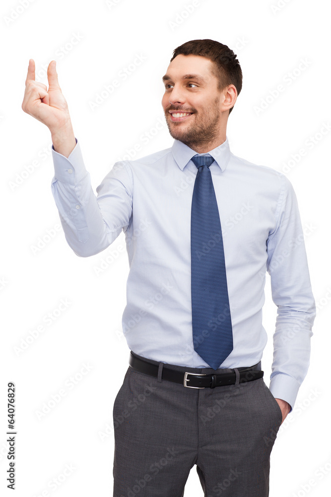 handsome buisnessman holding imaginary light bulb handsome buisnessman holding imaginary light bulb