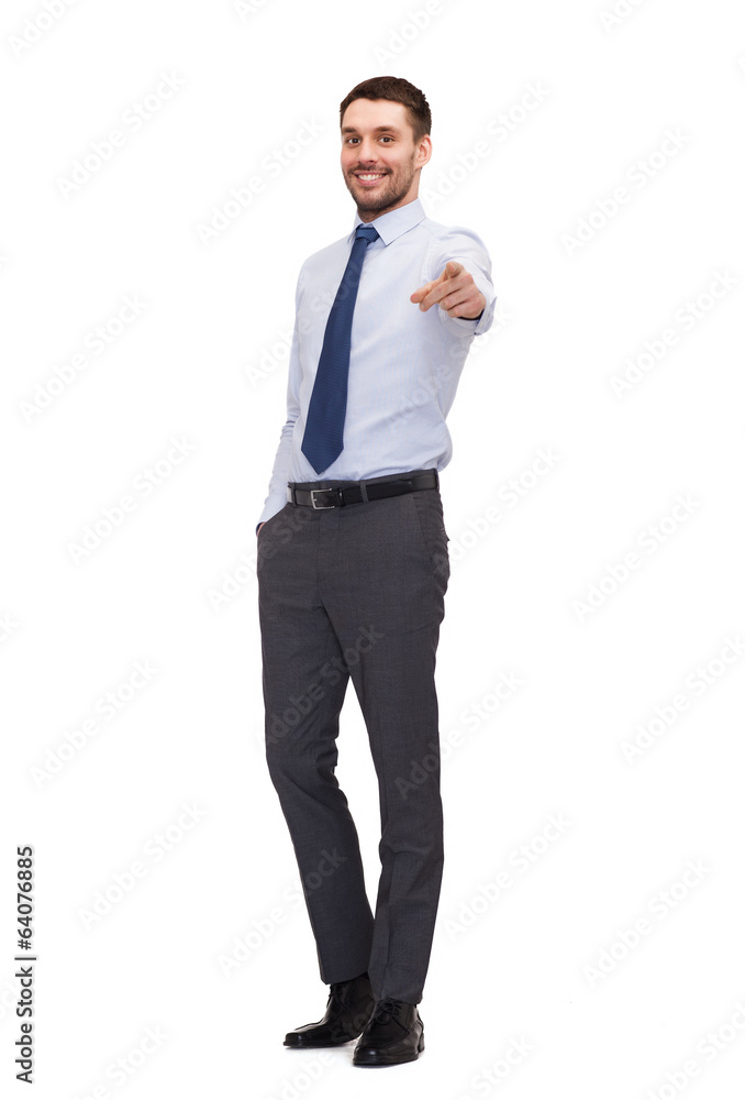 handsome buisnessman pointing finger at you handsome buisnessman pointing finger at you