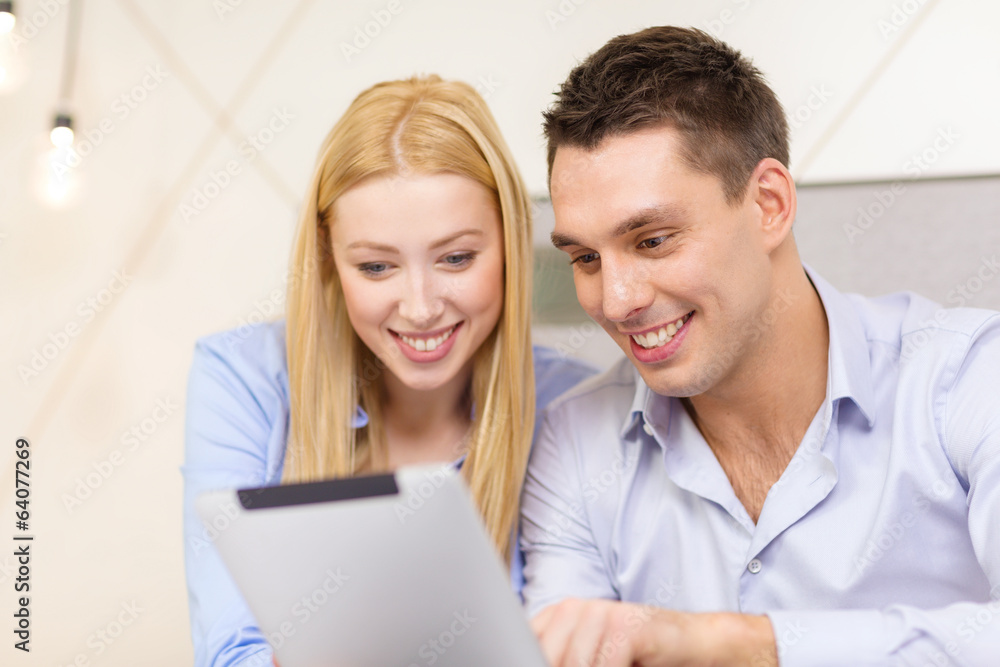 couple with tablet pc computer in hotel room couple with tablet pc computer in hotel room