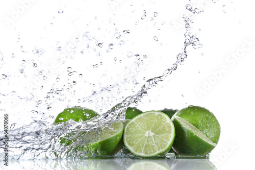 Limes with water splash