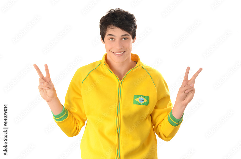 Man signing victory to Brazil.Happy football fan in sport blouse Man signing victory to Brazil.Happy football fan in sport blouse