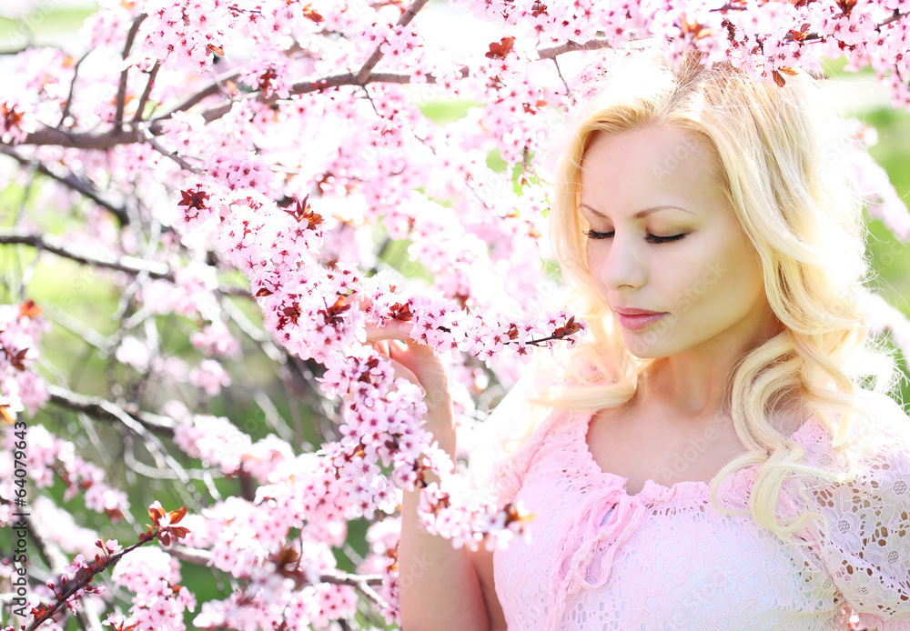 Blonde Girl with Cherry Blossom. Spring Portrait. Blonde Girl with Cherry Blossom. Spring Portrait.