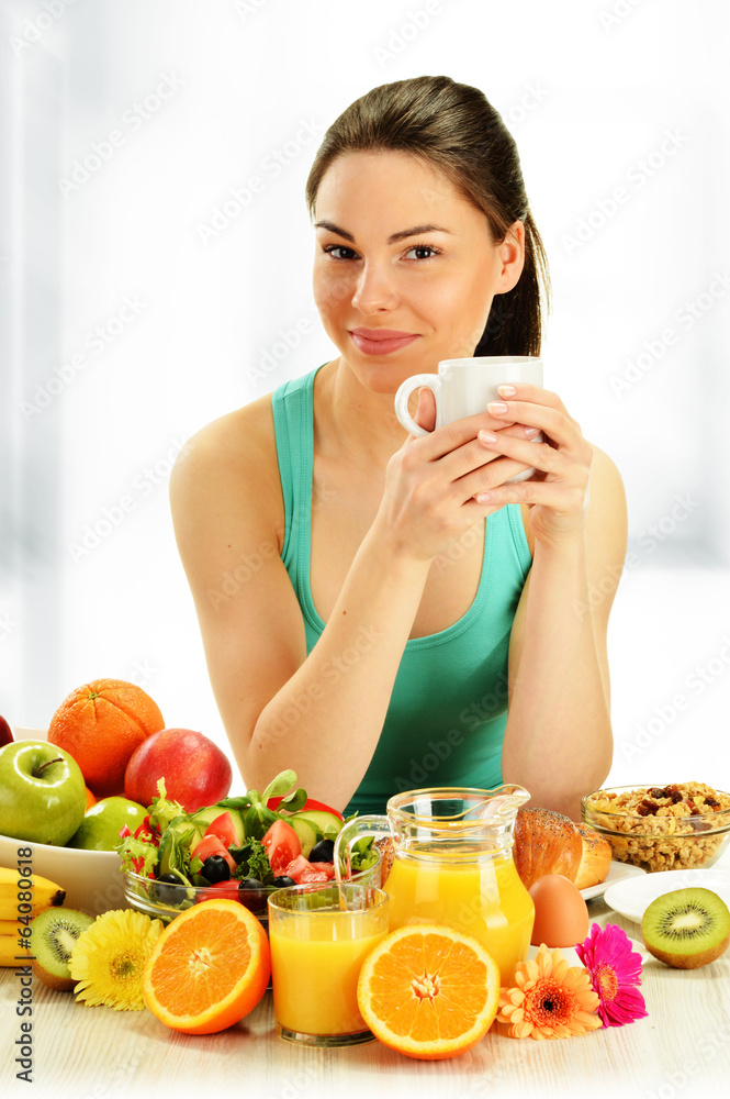 Young woman having breakfast. Balanced diet Young woman having breakfast. Balanced diet