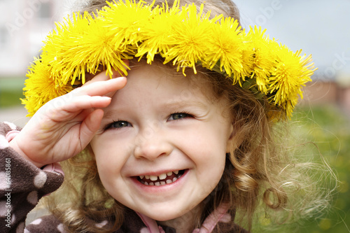 Happy girl with floral headwreath photo