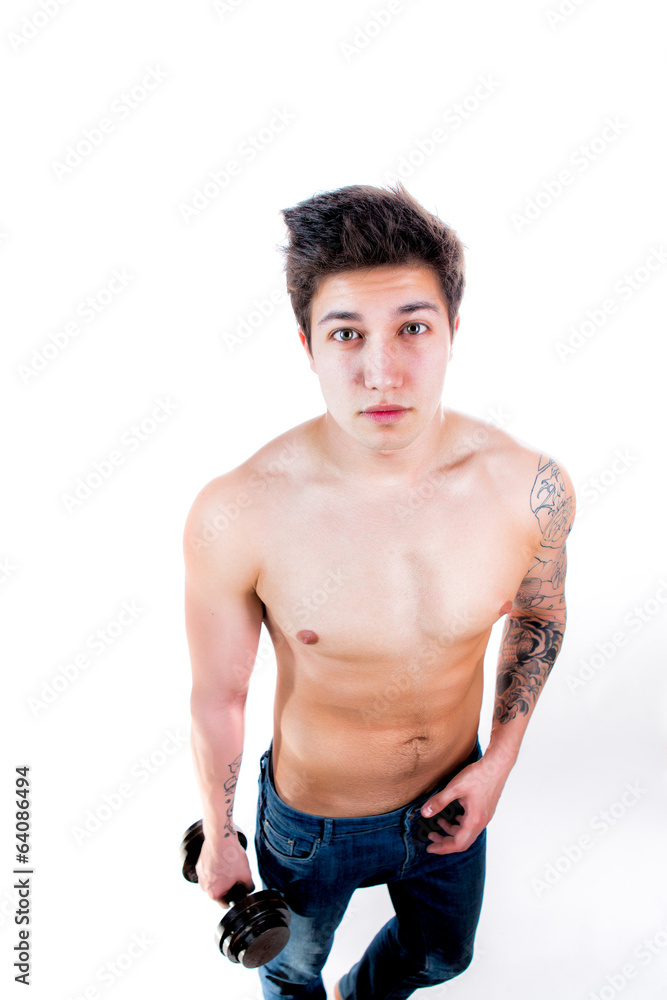 Fototapeta premium Closeup of a muscular young man lifting weights