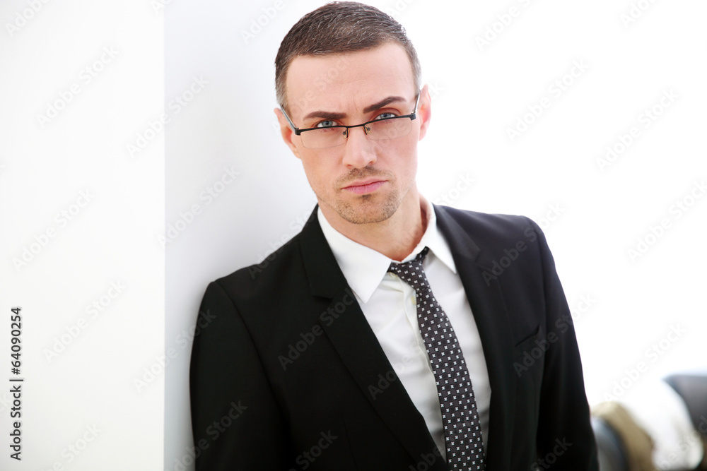 Portrait of a confident businessman in glasses Portrait of a confident businessman in glasses