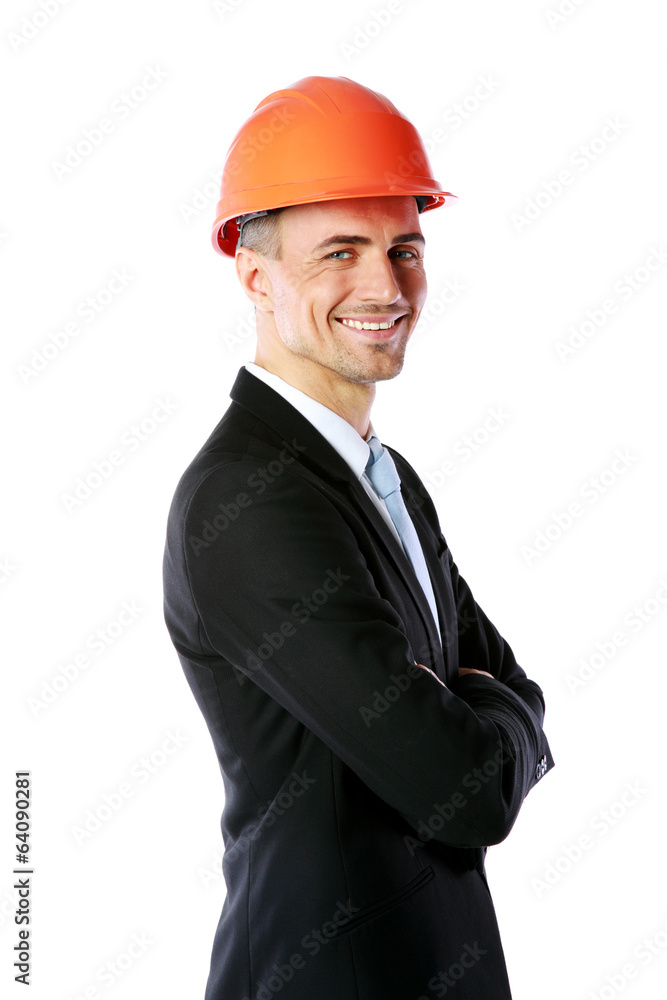 Happy businessman in helmet with arms folded Happy businessman in helmet with arms folded