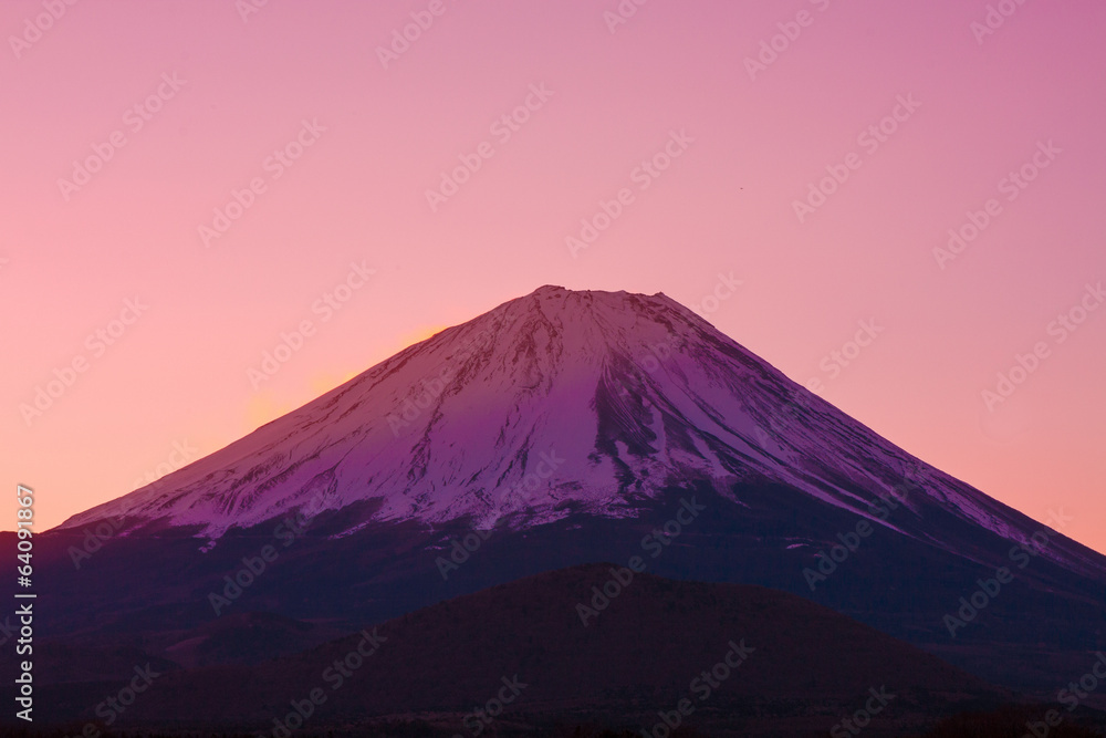 Vermilion sky and the summit of Mount Fuji
