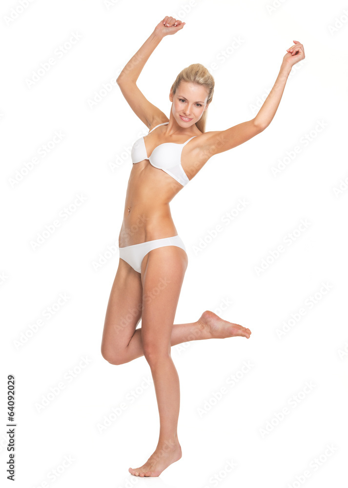 Full length portrait of happy young woman in lingerie Full length portrait of happy young woman in lingerie