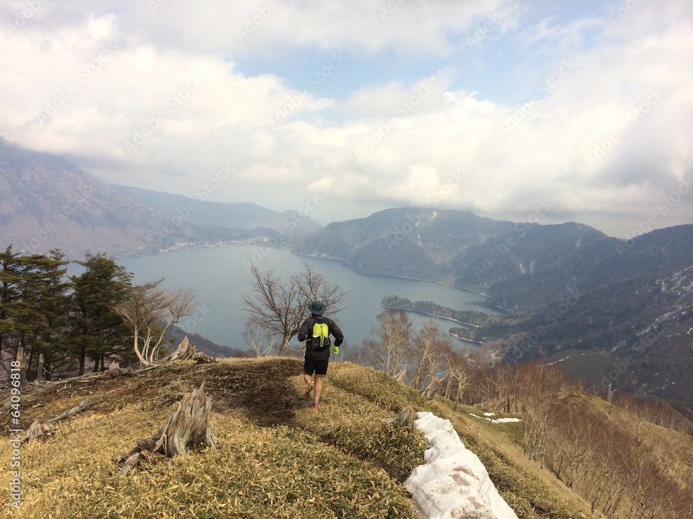 Man Trailrunning on Mountain Path